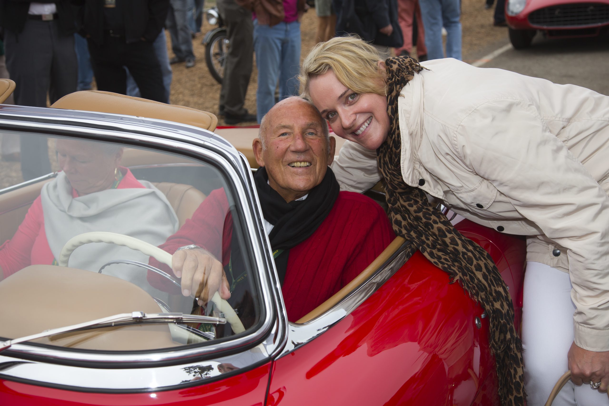 In the Driver’s Seat: How Sandra Button Steered The Pebble Beach Concours d’Elegance for 40 Years - Exhibit Year 2012 - Sir Stirling Moss and Sandra Button - Image credit: Kimball Studios/Pebble Beach Concours d'Elegance